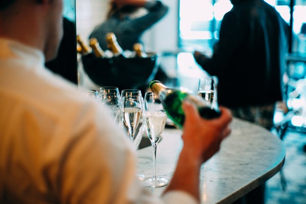 champagne being poured at a special occasion